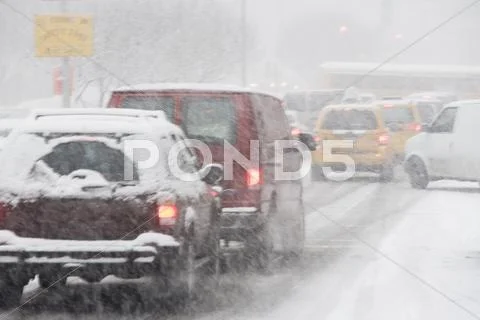 USA, New York City, city traffic in snowstorm Stock Photos