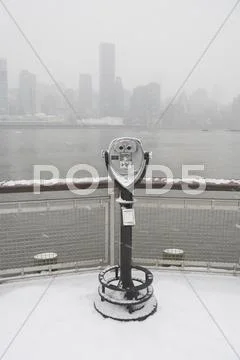 USA, New York City, coin operated binoculars overlooking foggy Manhattan Stock Photos