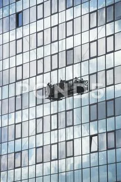 USA, New York City, Manhattan, window cleaning platform on building Stock Photos