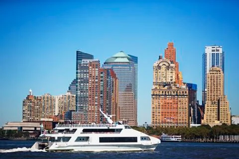 USA, New York City, Manhattan, Battery Park skyline with yacht Stock Photos