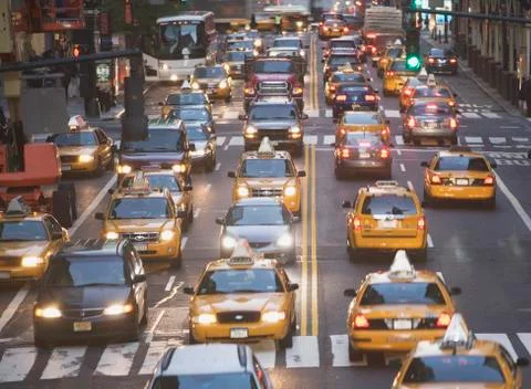USA, New York City, Manhattan, Traffic stopped at zebra crossing on 42nd street Stock Photos