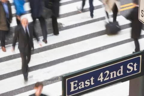 USA, New York City, Manhattan, 42nd street, Pedestrians on zebra crossing Stock Photos