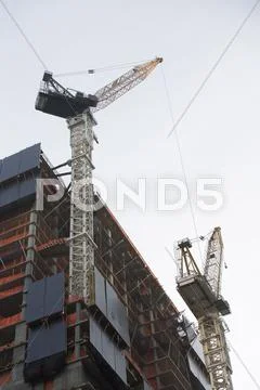 USA, New York City, Modern office building under construction Stock Photos