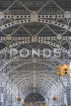 USA, New York City, Traffic lights under bridge Stock Photos