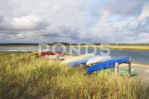 USA, New York, Long Island, East Hampton, Boats lying upside down on jetty Stock Photos