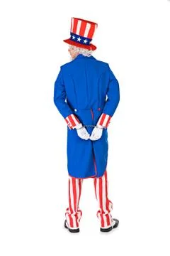 USA: Uncle Sam Under Arrest and In Handcuffs Stock Photos