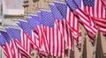 USA United States flags facade waving slow motion sunny day HD Footage