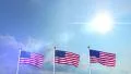 USA US 3 American Flags Waving Against Blue Sky CG Flare 4K 4k or 4k+ Resolution