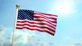 USA US American Flag Medium Shot Waving Against Blue Sky CG Flare HD Footage