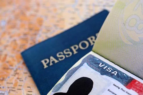 USA visa background. US visa in passport on United States geographical map Stock Photos