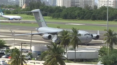 USAF C17 Global Master and Airliner taking off 1 Stock Footage 904959