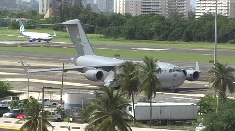 USAF C17 Global Master and Airliner taking off 2 Stock Footage 905591