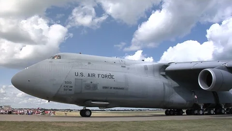 USAF Lockheed C-5 Galaxy -taxis past camera Stock Footage 90399398