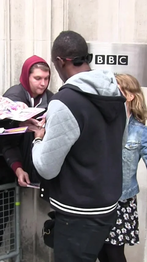 Usain Bolt Jamaican sprinter seen leaving BBC Radio Two studios Stock Footage 280556807