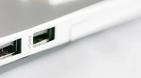 USB 3.0 cable connector being plugged into computer Stock-Footage 67688074