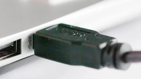 USB 3.0 cable connector being plugged into computer Stock-Footage 67688114