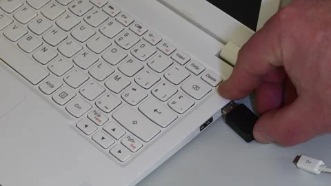 USB adapter between usb type-a and usb-micro. Connection to computer. Stock Footage 302239934