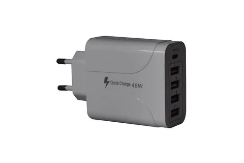 USB adapter for charging multiple mobile phones and modern devices on a tra.. Stock Photos