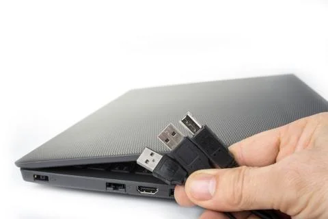 USB and power source plug of modern slim lightweight laptop Stock Photos
