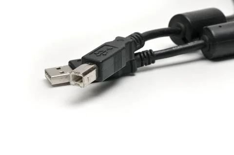 USB A and USB B printer plug cable on white background Stock Photos