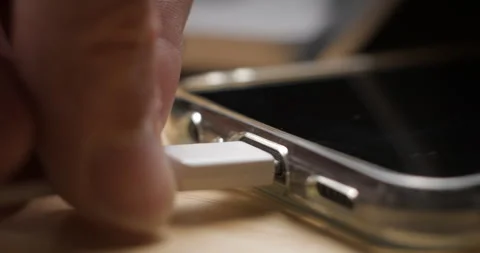 USB-C cable macro plugin to smartphone slow motion Video stock 281040397