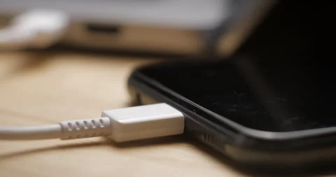 USB-C cable macro plugin to smartphone slow motion Stock Footage 281040399