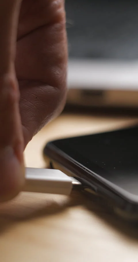 USB-C cable macro plugin to smartphone slow motion, vertical view Stock-Footage 281040723
