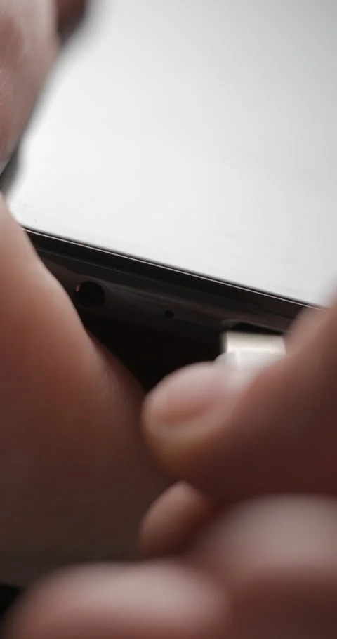 USB-C cable macro plugin to smartphone slow motion, vertical view Video stock 281040818