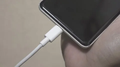 USB-C cable macro plugin to smartphone Stock-Footage 307069129