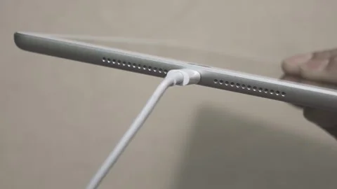 USB-C cable macro plugin to tablet Stock-Footage 307069218