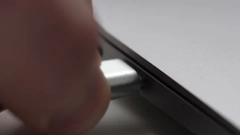 USB-C Computer Cable Connecting to a Laptop Stock Footage 148241090