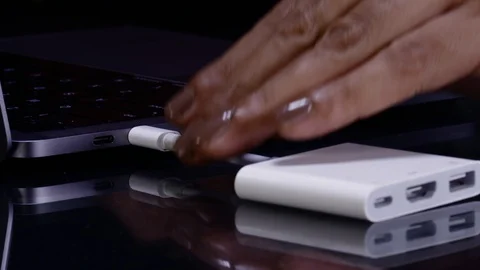 USB-C Laptop Dongle In Video stock 129331889