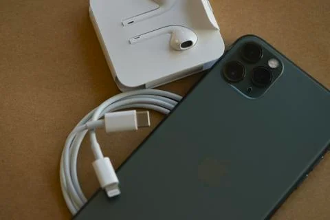 USB-C type to Lightning fast charging cable of with iPhone 11 Pro Max Stock Photos