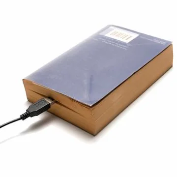 Usb cable and book Stock Photos