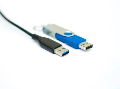 USB cable and usb flash memory isolated on the white background Stock Photos