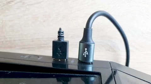 USB cable connection to a computer. Hard disk drive, USB cable data transfer Stock Footage 277351564