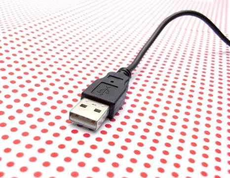Usb cable on dotted background 스톡 사진