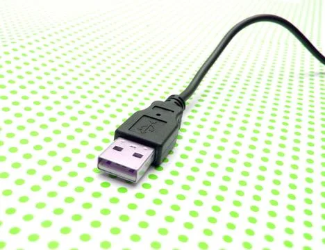 Usb cable on dotted background usb cable on dotted background ,model relea... Stock Photos
