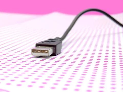 Usb cable on dotted background usb cable on dotted background ,model relea... Stock Photos