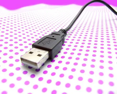 Usb cable on dotted background usb cable on dotted background ,model relea... Stock Photos
