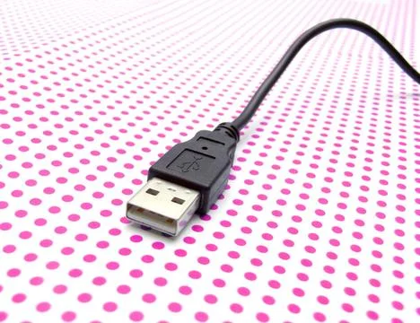 Usb cable on dotted background usb cable on dotted background ,model relea... Stock Photos