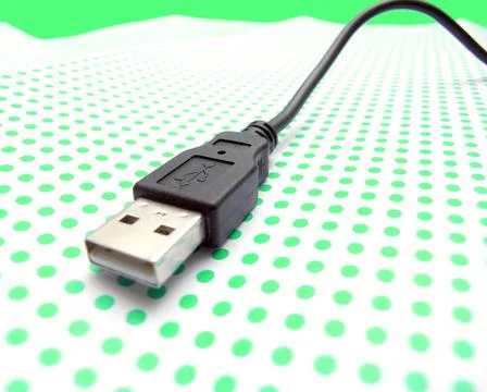 Usb cable on dotted background usb cable on dotted background ,model relea... Stock Photos