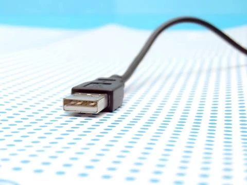 Usb cable on dotted background usb cable on dotted background ,model relea... Stock Photos