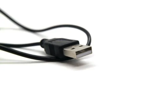 USB cable for electronic devices black color isolated on white background. Stock Photos