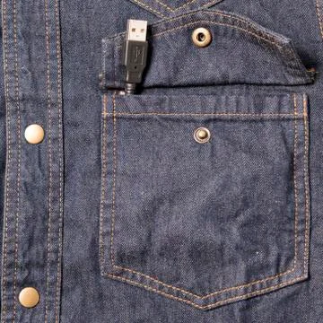 Usb cable in jean pocket Фото