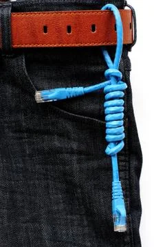 Usb cable on jeans background Stock Photos