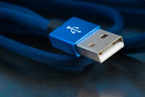 Usb cable on metallic background Stock Photos