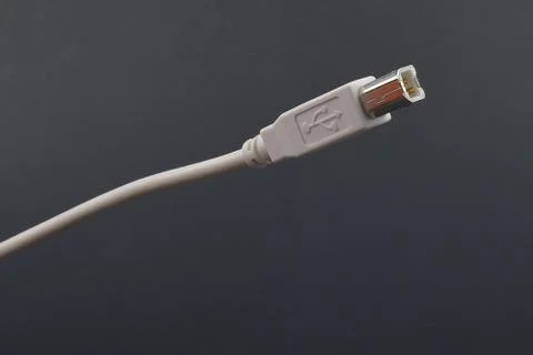USB Cable Plug  on dark background Stock Photos