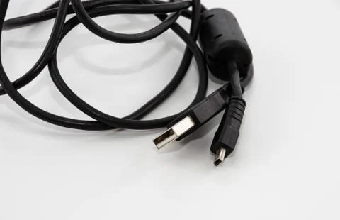 USB cable for various devices and photo camera Stock Photos