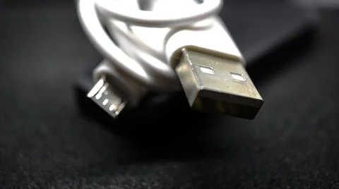 USB cable is white. object photography style Stock Photos
